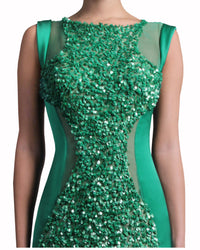 فستان طويل مغطى بالترتر مع ظهر شفاف