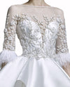 Feather-Sleeved Gown