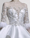 Feather-Sleeved Gown