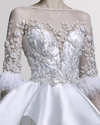 Feather-Sleeved Gown