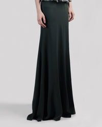 A long flowy green skirt.