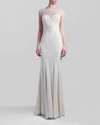 A long ivory dress featuring a lace bodice with short-sleeves.